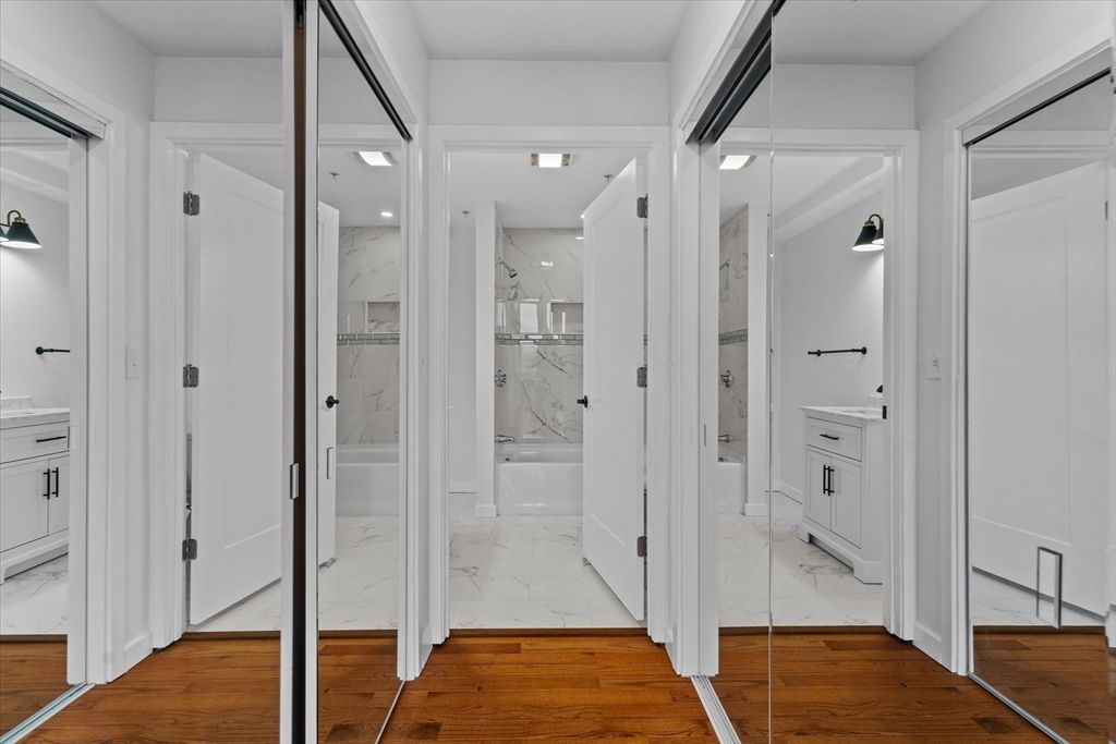 Bathroom, Glass Shower, Interior, Marble, Marble Walls, Recessed Lighting, Wood Texture Flooring