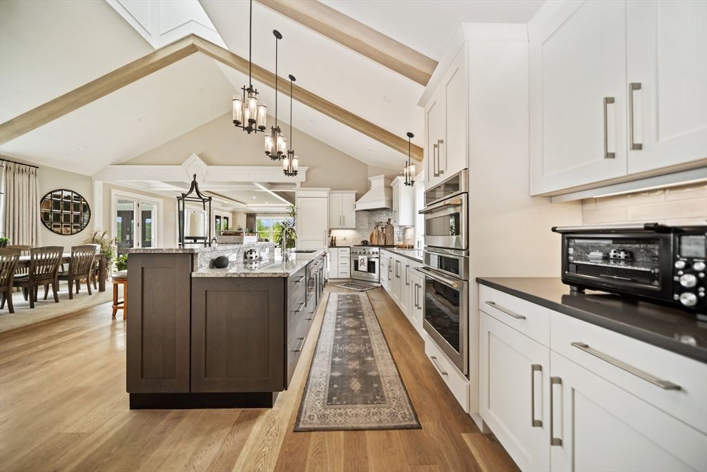 Dining room, Interior, Kitchen, Pendant Lights, Recessed Lighting, Stainless Steel Appliances, Wooden Beams, Wood Texture Flooring