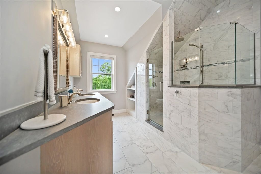 Bathroom, Dual Sink Vanities, Glass Shower, Interior, Marble, Marble Walls, Recessed Lighting