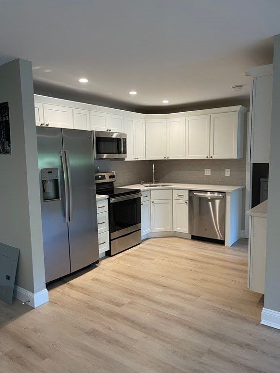 Interior, Kitchen, Recessed Lighting, Stainless Steel Appliances, Wood Texture Flooring