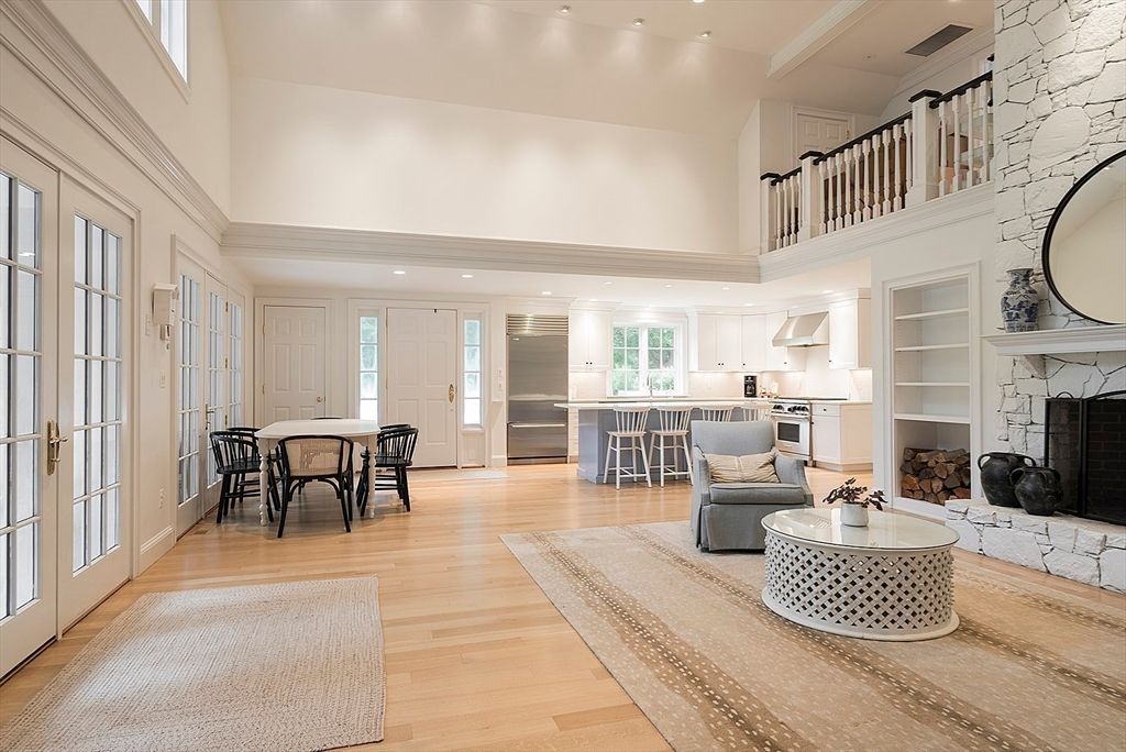 Dining room, Fireplace, Interior, Kitchen, Recessed Lighting, Stone Walls, Wood Texture Flooring