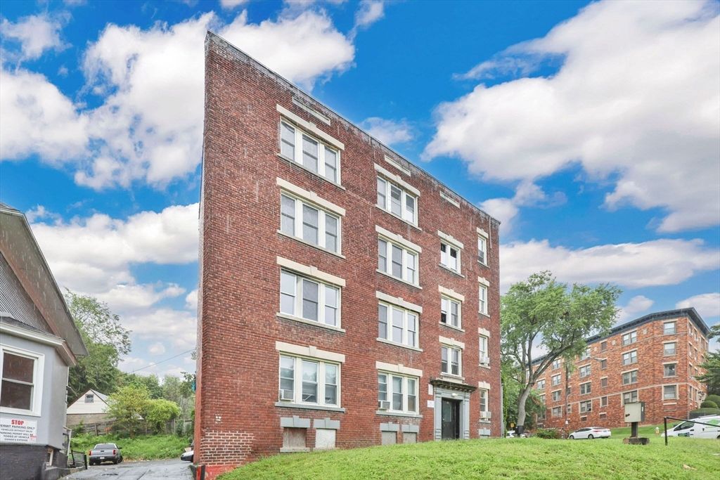 Exterior, Facade, Brick Facade, Condo Building