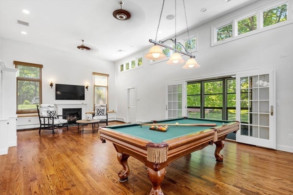 Billiard Table, Fireplace, Game Room, Interior, Pendant Lights, Recessed Lighting, Wood Texture Flooring