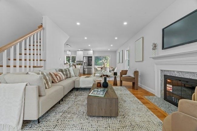 Dining room, Fireplace, Interior, Living room, Recessed Lighting, Wood Texture Flooring