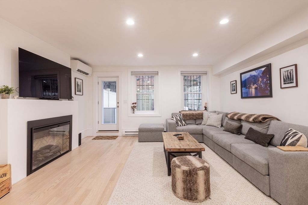 Fireplace, Interior, Living room, Recessed Lighting, Wood Texture Flooring