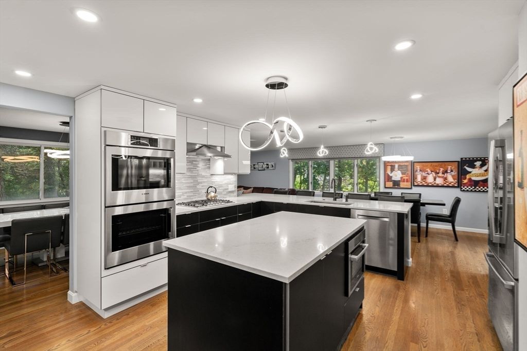 Dining room, Interior, Kitchen, Pendant Lights, Recessed Lighting, Stainless Steel Appliances, Wood Texture Flooring