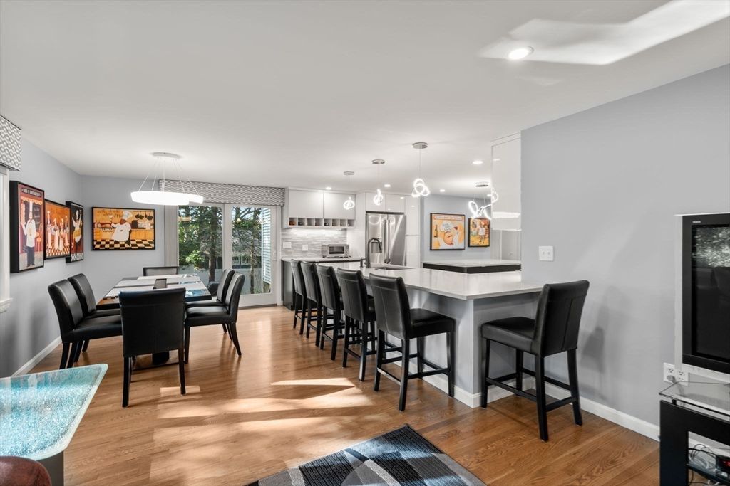 Dining room, Interior, Kitchen, Pendant Lights, Recessed Lighting, Stainless Steel Appliances, Wood Texture Flooring