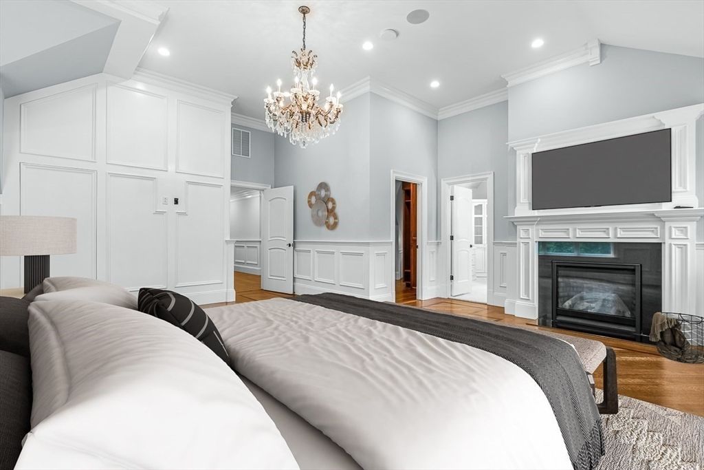 Bedroom, Chandelier, Fireplace, Interior, Recessed Lighting, Wood Texture Flooring