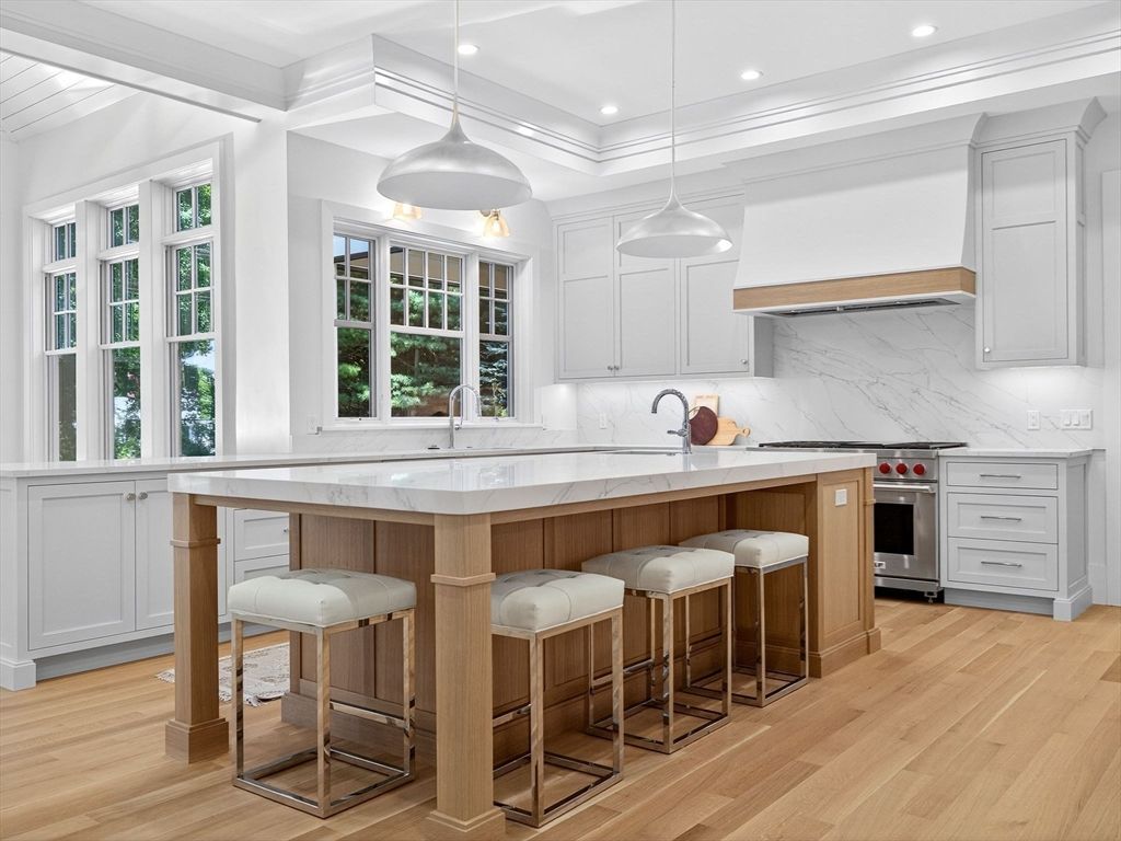 Interior, Kitchen, Marble Walls, Pendant Lights, Recessed Lighting, Stainless Steel Appliances, Wood Texture Flooring