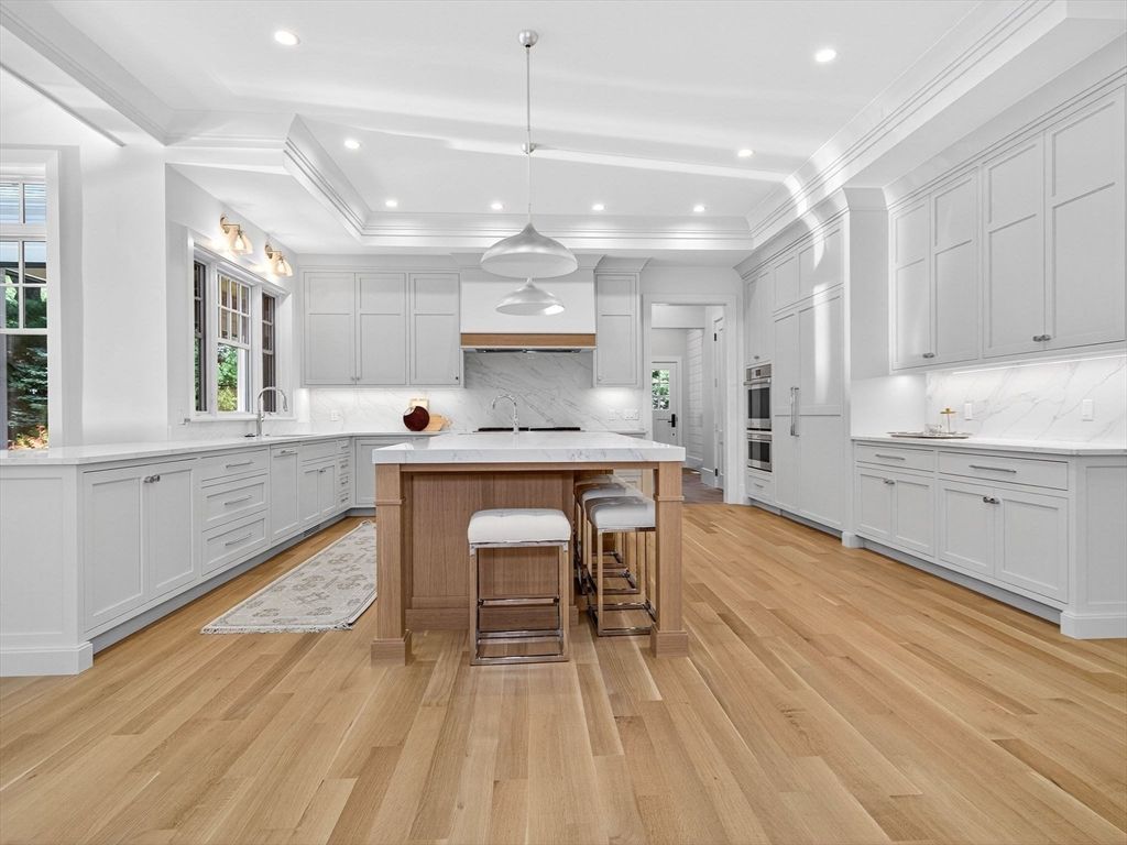 Interior, Kitchen, Marble Walls, Pendant Lights, Recessed Lighting, Stainless Steel Appliances, Wood Texture Flooring