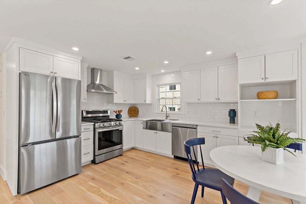 Dining room, Interior, Kitchen, Recessed Lighting, Stainless Steel Appliances, Wood Texture Flooring