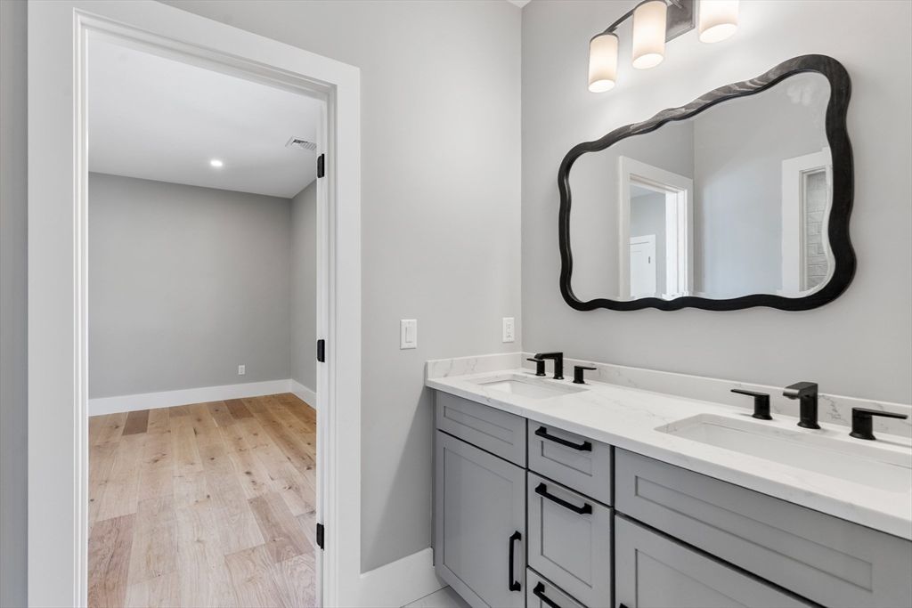 Bathroom, Dual Sink Vanities, Interior, Recessed Lighting, Wood Texture Flooring