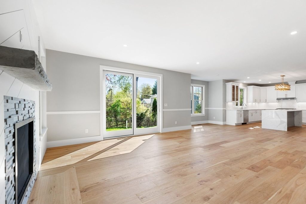 Chandelier, Fireplace, Interior, Kitchen, Pendant Lights, Recessed Lighting, Wood Texture Flooring