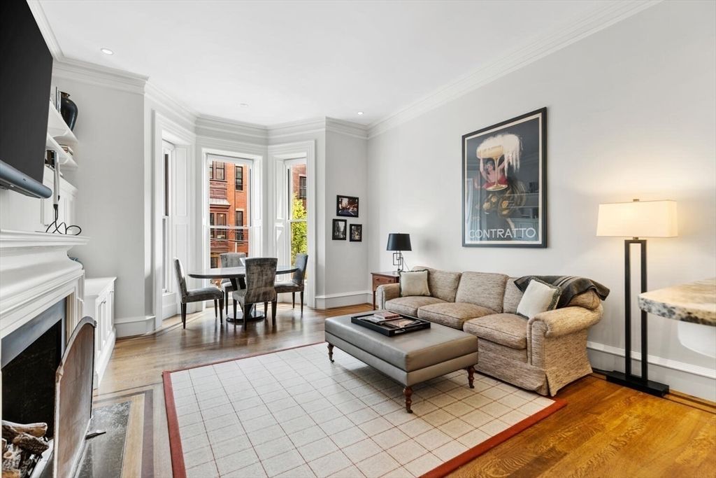 Dining room, Fireplace, Interior, Living room, Recessed Lighting, Wood Texture Flooring