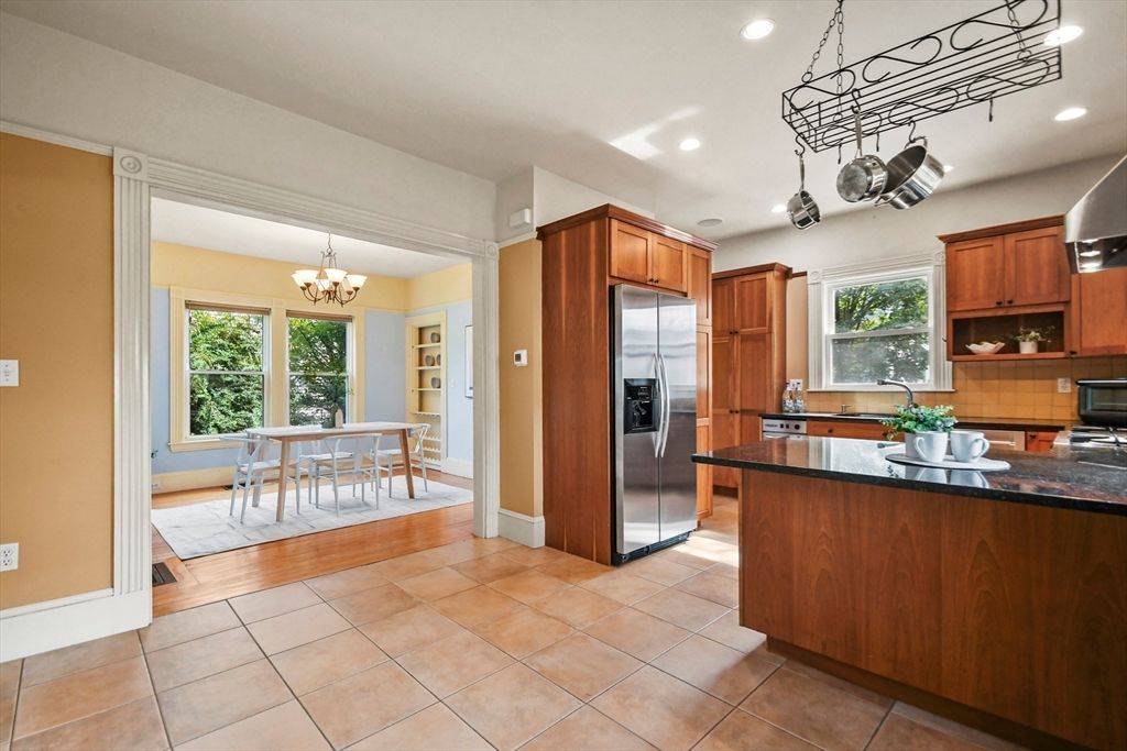 Chandelier, Dining room, Interior, Kitchen, Recessed Lighting, Stainless Steel Appliances, Wood Texture Flooring