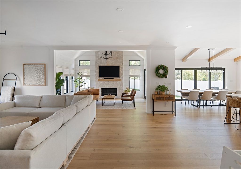 Dining room, Fireplace, Interior, Living room, Pendant Lights, Recessed Lighting, Stone Walls, Wooden Beams, Wood Texture Flooring