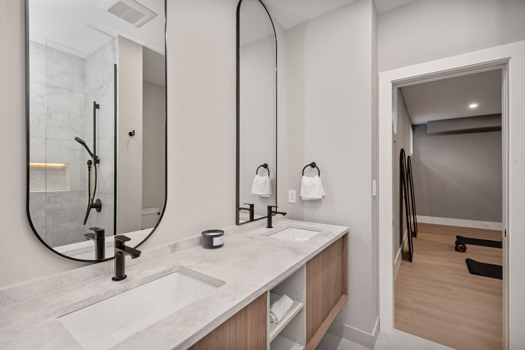 Bathroom, Dual Sink Vanities, Glass Shower, Interior, Recessed Lighting, Wood Texture Flooring