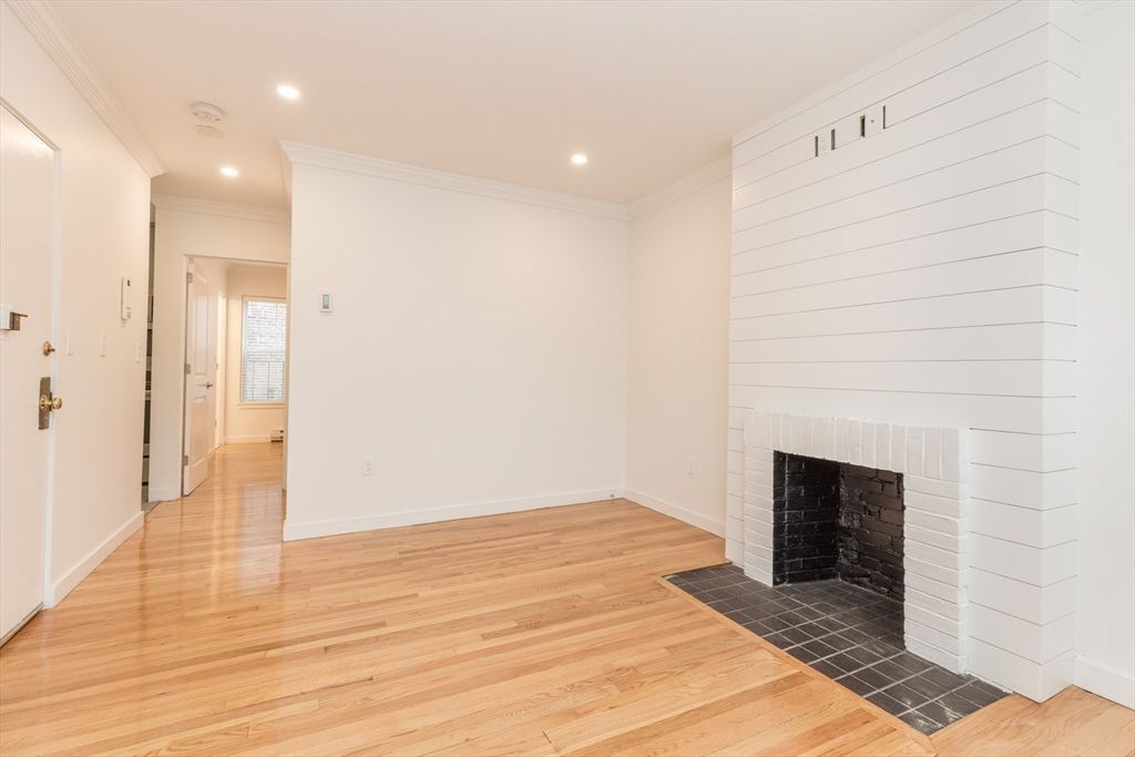 Empty room, Fireplace, Interior, Recessed Lighting, Wood Texture Flooring