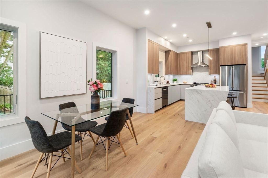 Dining room, Interior, Kitchen, Pendant Lights, Recessed Lighting, Stainless Steel Appliances, Wood Texture Flooring