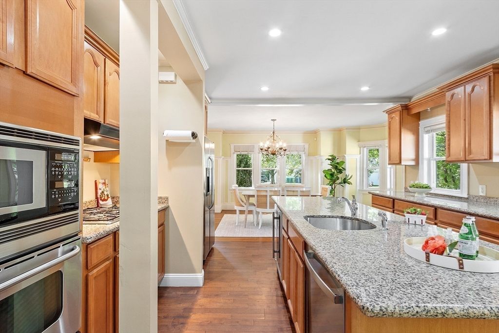 Chandelier, Dining room, Interior, Kitchen, Recessed Lighting, Stainless Steel Appliances, Wood Texture Flooring