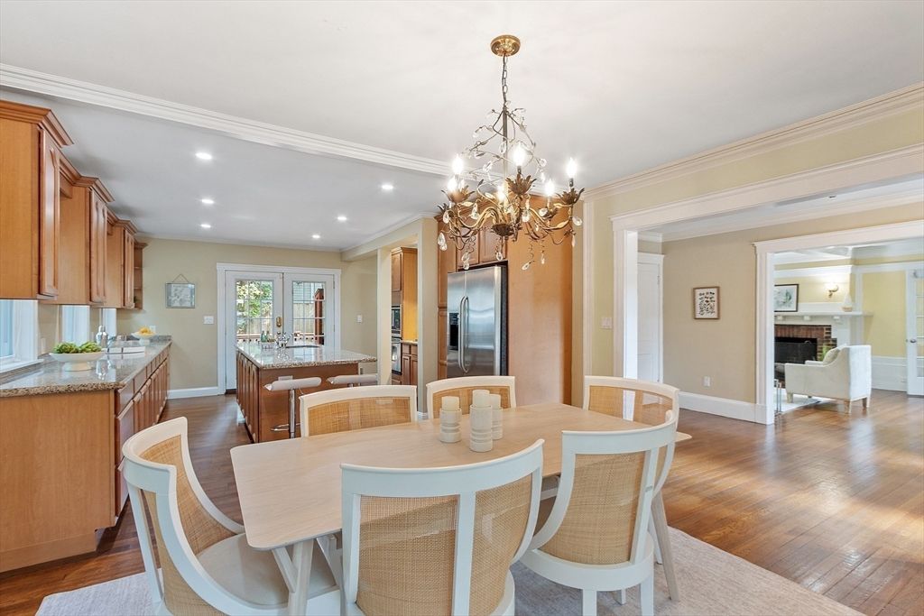 Chandelier, Dining room, Fireplace, Interior, Kitchen, Recessed Lighting, Wood Texture Flooring
