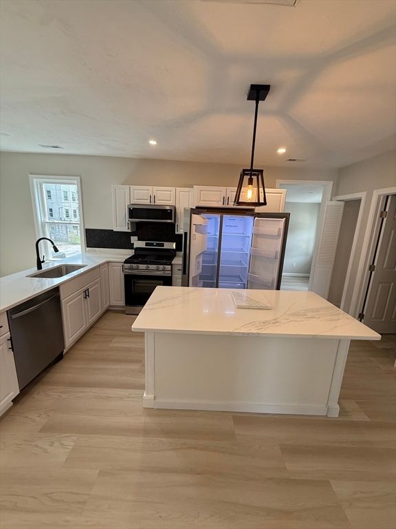 Interior, Kitchen, Pendant Lights, Recessed Lighting, Stainless Steel Appliances, Wood Texture Flooring