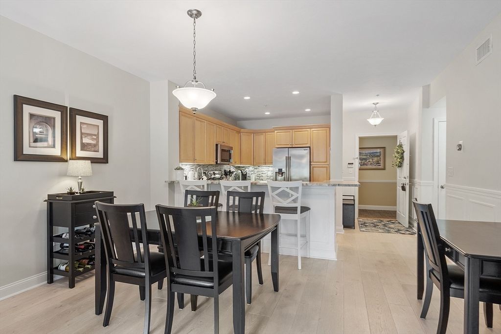 Dining room, Interior, Kitchen, Pendant Lights, Recessed Lighting, Stainless Steel Appliances, Wood Texture Flooring