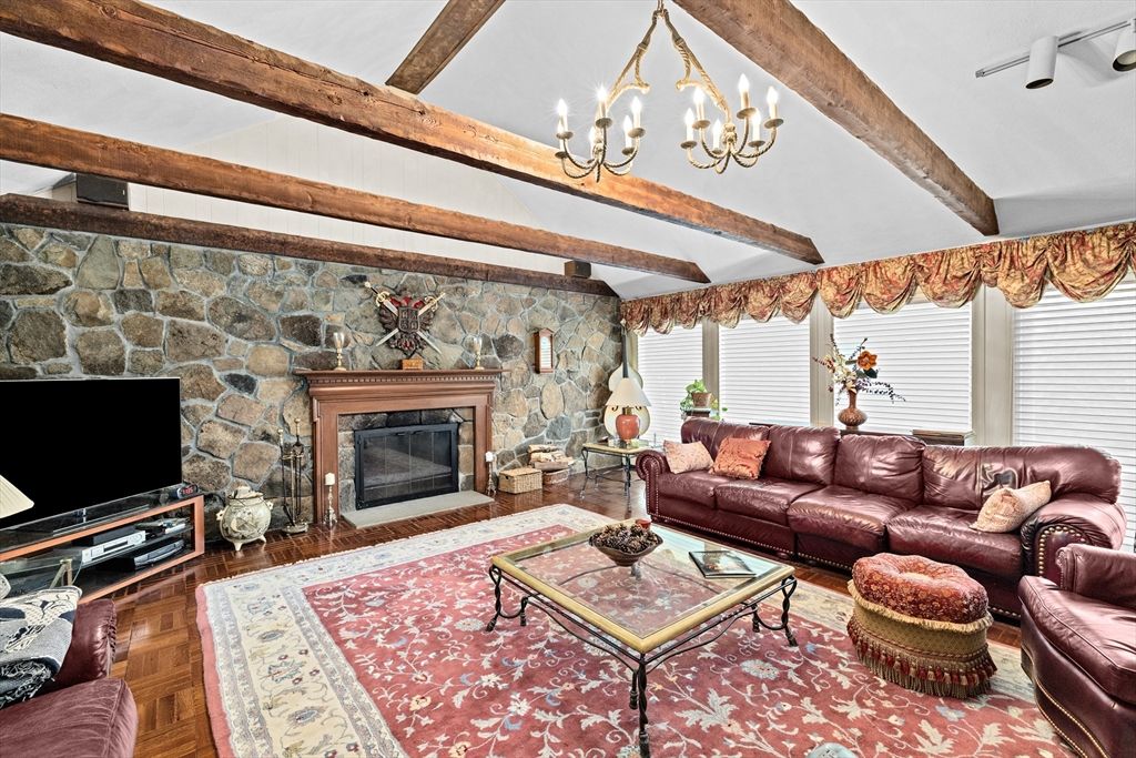 Chandelier, Fireplace, Interior, Living room, Stone Walls, Wooden Beams, Wood Texture Flooring