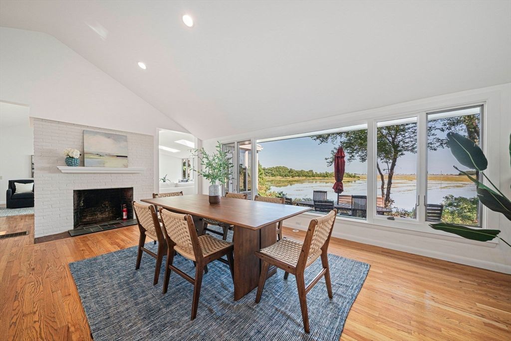 Dining room, Fireplace, Interior, Recessed Lighting, Water, Wood Texture Flooring