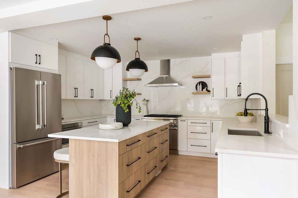 Interior, Kitchen, Marble Walls, Pendant Lights, Recessed Lighting, Stainless Steel Appliances, Wood Texture Flooring