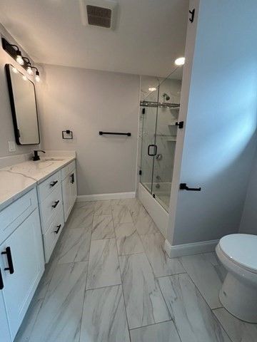 Bathroom, Dual Sink Vanities, Glass Shower, Interior, Marble, Recessed Lighting