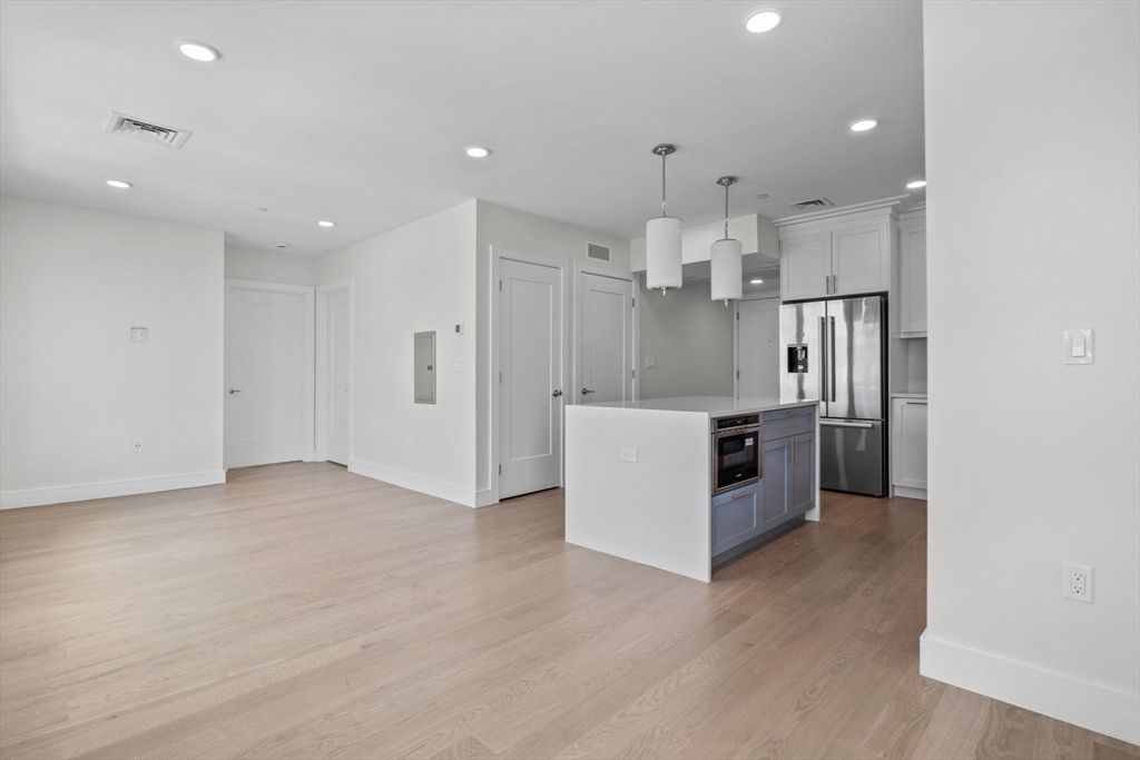 Interior, Kitchen, Pendant Lights, Recessed Lighting, Stainless Steel Appliances, Wood Texture Flooring