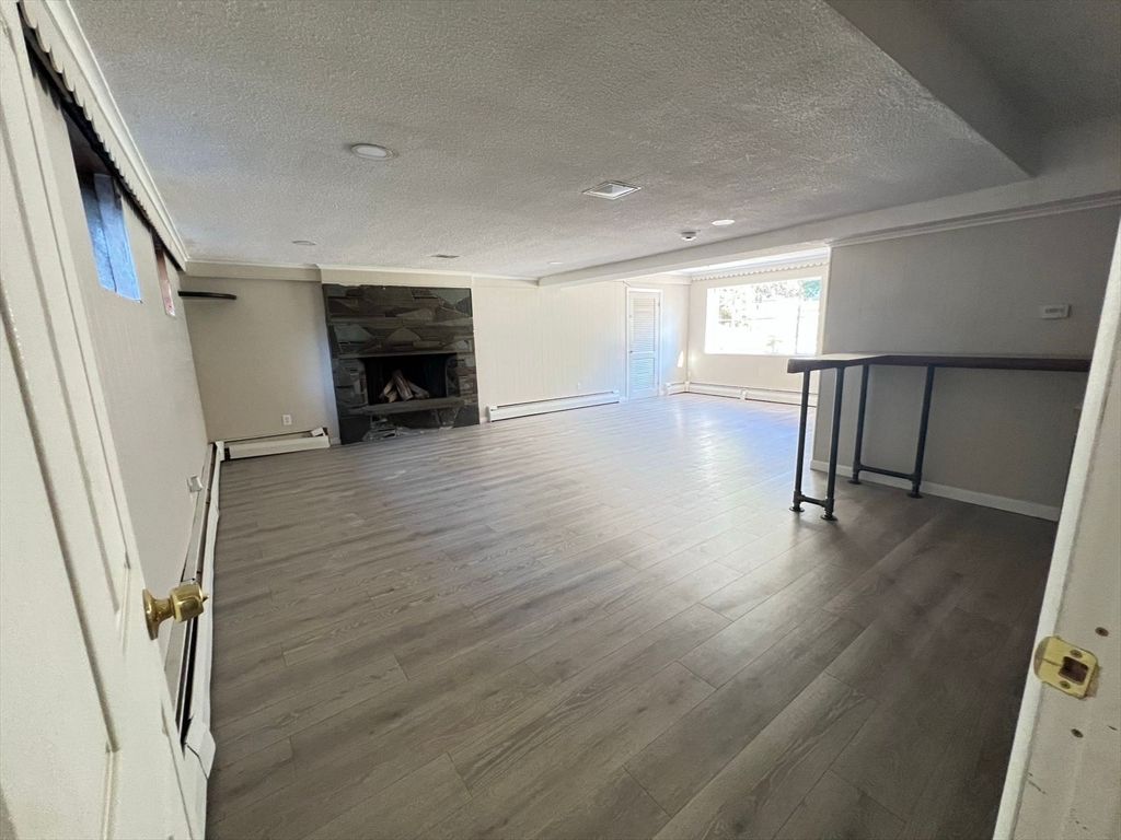 Empty room, Fireplace, Interior, Recessed Lighting, Wood Texture Flooring
