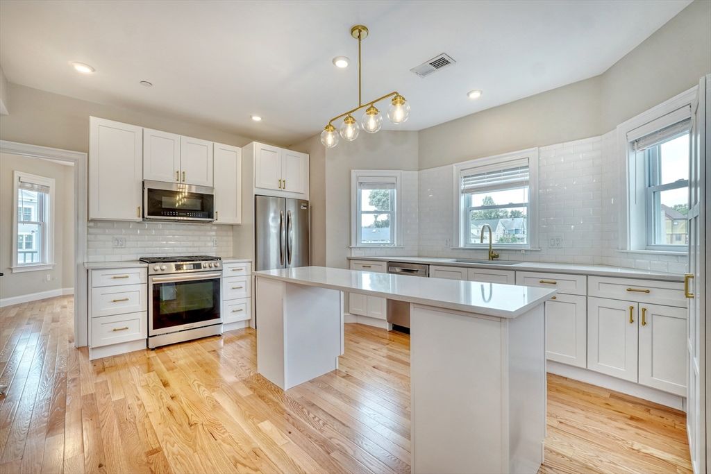 Interior, Kitchen, Pendant Lights, Recessed Lighting, Stainless Steel Appliances, Wood Texture Flooring