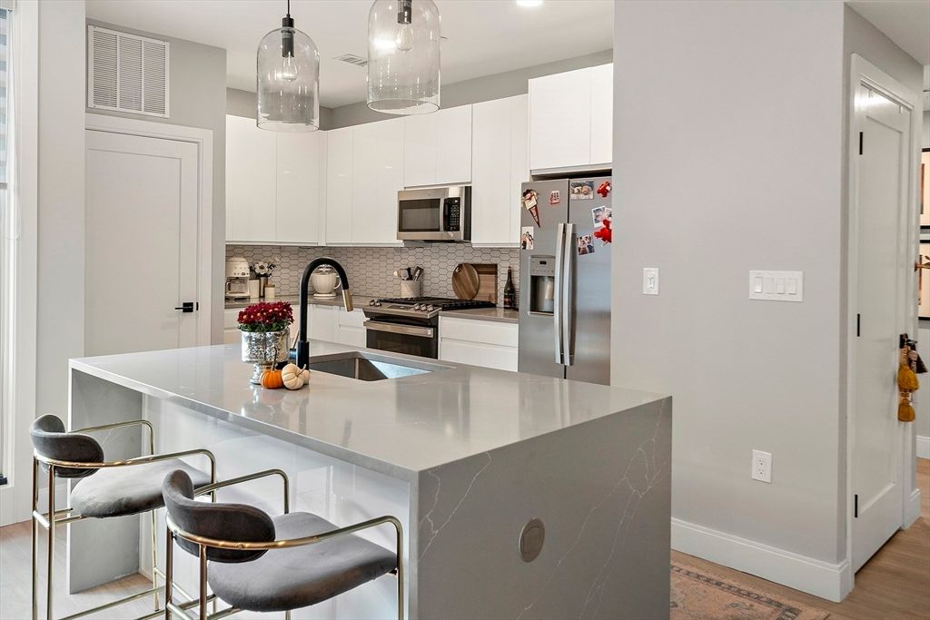 Interior, Kitchen, Pendant Lights, Recessed Lighting, Stainless Steel Appliances, Wood Texture Flooring