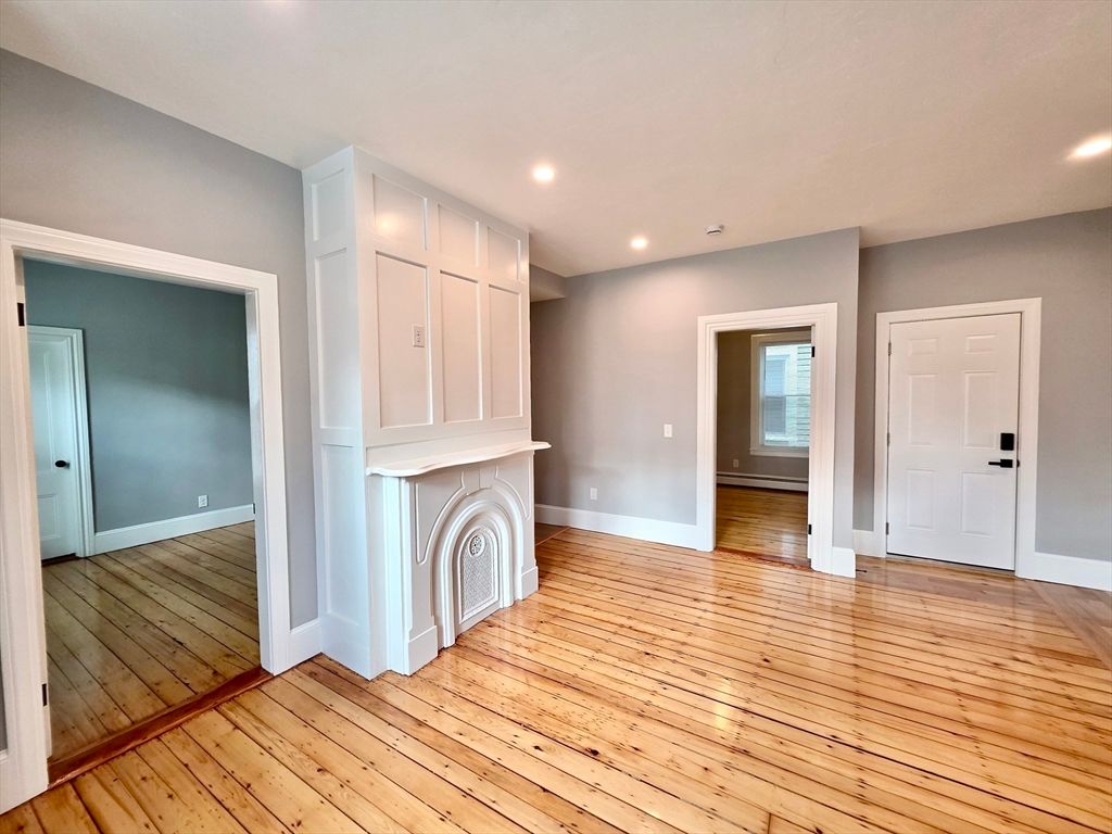 Empty room, Fireplace, Interior, Recessed Lighting, Wood Texture Flooring