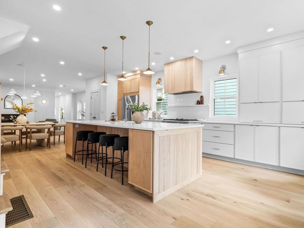 Dining room, Interior, Kitchen, Pendant Lights, Recessed Lighting, Stainless Steel Appliances, Wood Texture Flooring