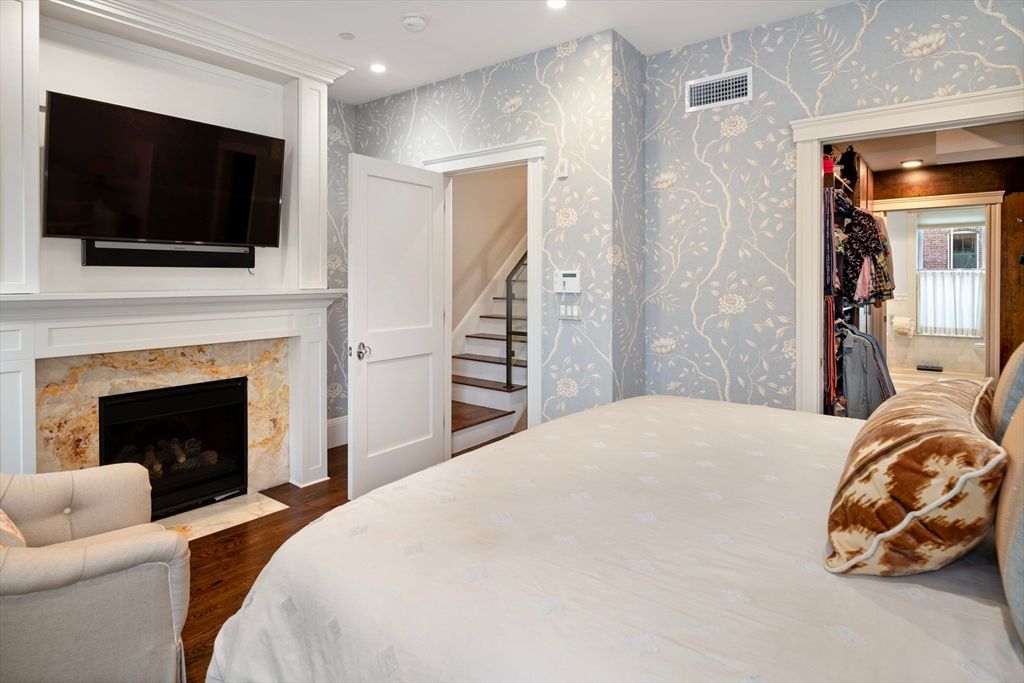 Bedroom, Fireplace, Interior, Recessed Lighting, Wood Texture Flooring