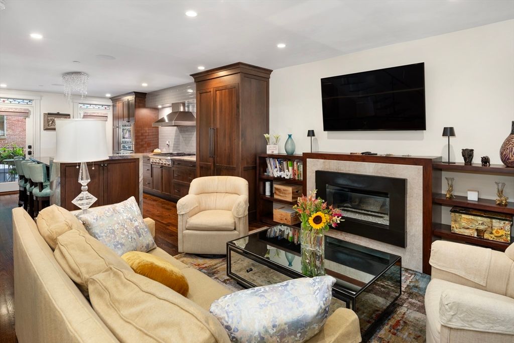 Fireplace, Interior, Kitchen, Living room, Recessed Lighting, Stainless Steel Appliances, Wood Texture Flooring