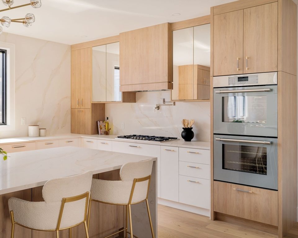 Interior, Kitchen, Marble Walls, Stainless Steel Appliances, Wood Texture Flooring