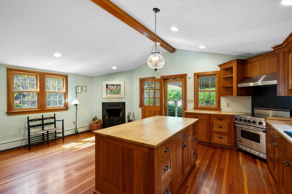 Dining room, Fireplace, Interior, Kitchen, Pendant Lights, Recessed Lighting, Stainless Steel Appliances, Wooden Beams, Wood Texture Flooring