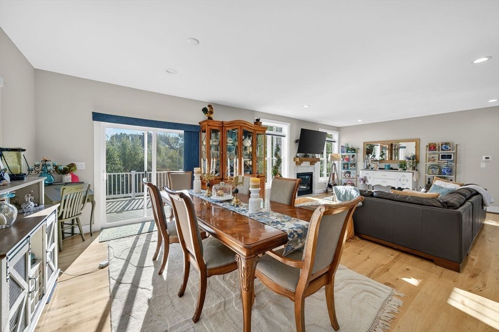 Dining room, Fireplace, Interior, Living room, Recessed Lighting, Wood Texture Flooring