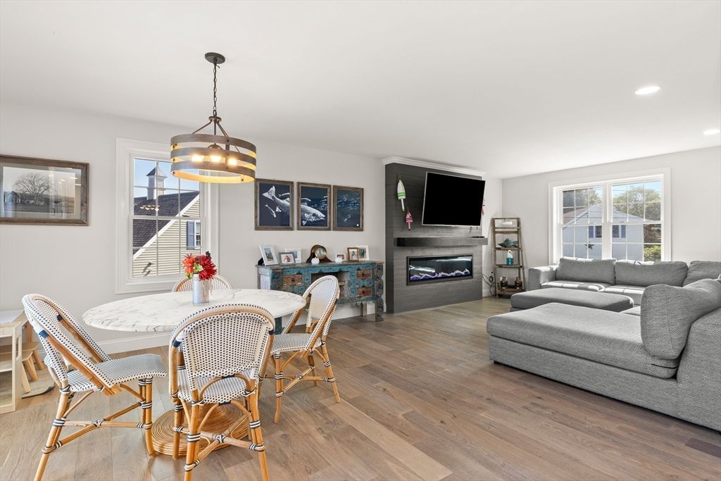 Dining room, Fireplace, Interior, Living room, Pendant Lights, Recessed Lighting, Wood Texture Flooring
