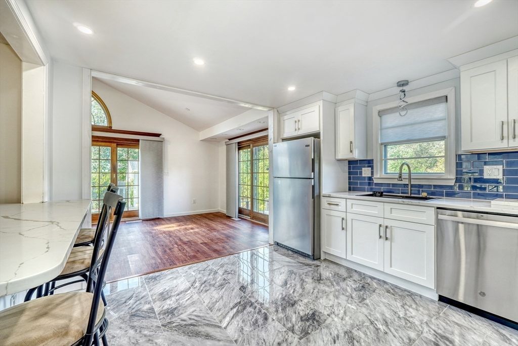 Dining room, Interior, Kitchen, Marble, Recessed Lighting, Stainless Steel Appliances, Wood Texture Flooring