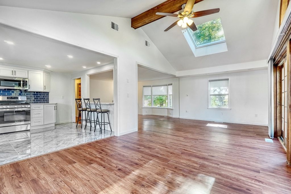 Empty room, Interior, Kitchen, Recessed Lighting, Stainless Steel Appliances, Wooden Beams, Wood Texture Flooring