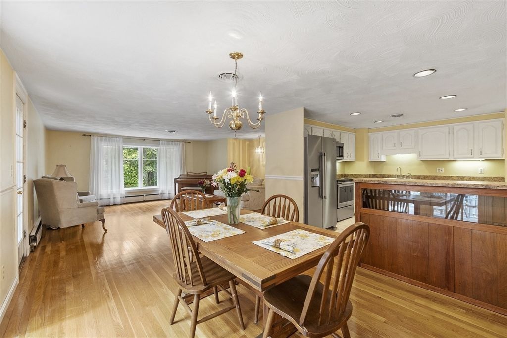 Chandelier, Dining room, Interior, Kitchen, Recessed Lighting, Stainless Steel Appliances, Wood Texture Flooring
