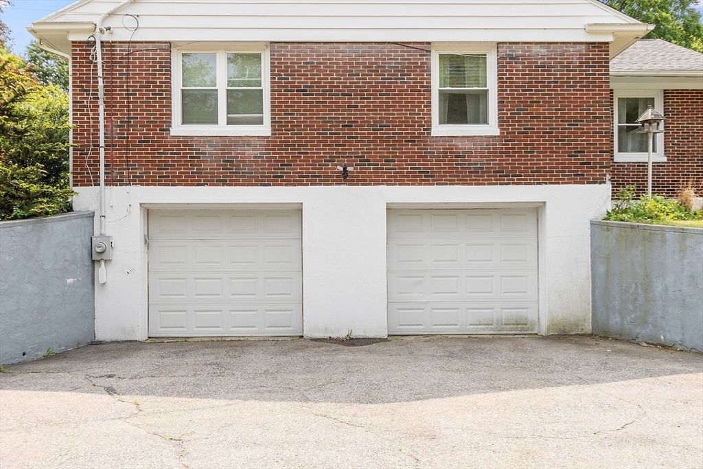 Attached, Exterior, Facade, Brick Facade, None