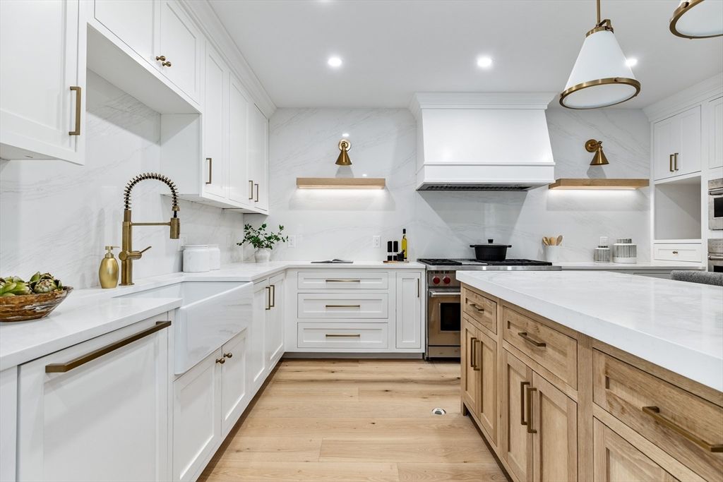 Interior, Kitchen, Marble Walls, Pendant Lights, Recessed Lighting, Stainless Steel Appliances, Wood Texture Flooring