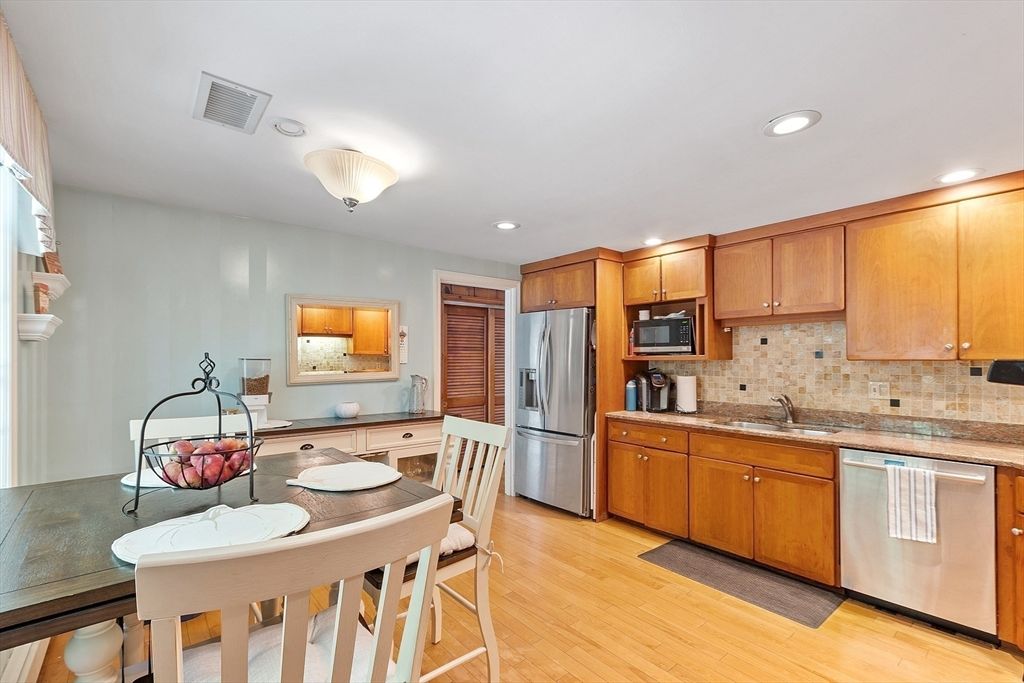 Dining room, Interior, Kitchen, Recessed Lighting, Stainless Steel Appliances, Wood Texture Flooring