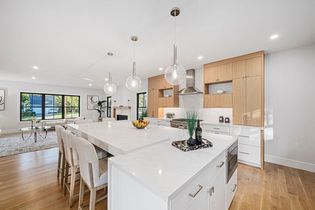 Dining room, Fireplace, Interior, Kitchen, Living room, Pendant Lights, Recessed Lighting, Stainless Steel Appliances, Wood Texture Flooring